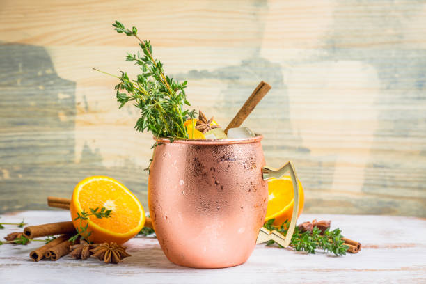 istock Cold orange Moscow mule cocktail in copper mug 941446494