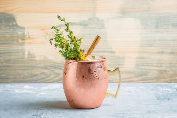 istock Cold orange Moscow mule cocktail in copper mug 941446510