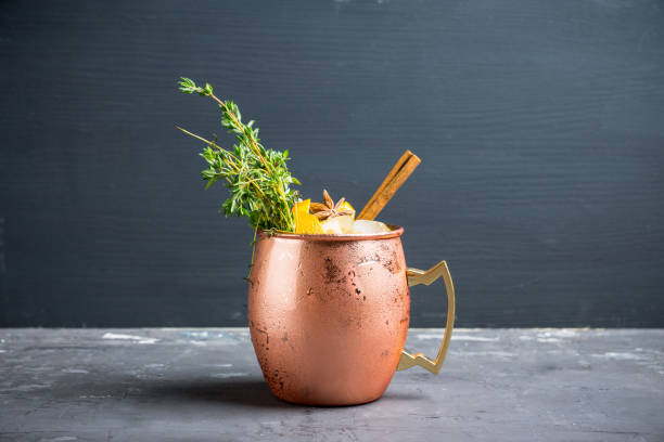 istock Cold orange Moscow mule cocktail in copper mug 941446518