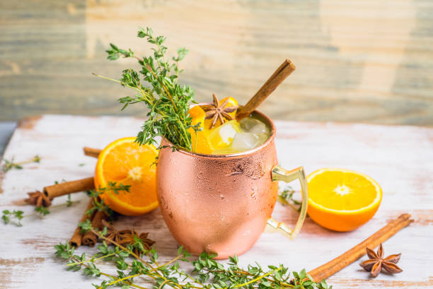 istock Cold orange Moscow mule cocktail in copper mug 941446530