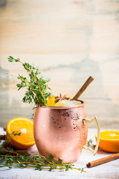 istock Cold orange Moscow mule cocktail in copper mug 941446534