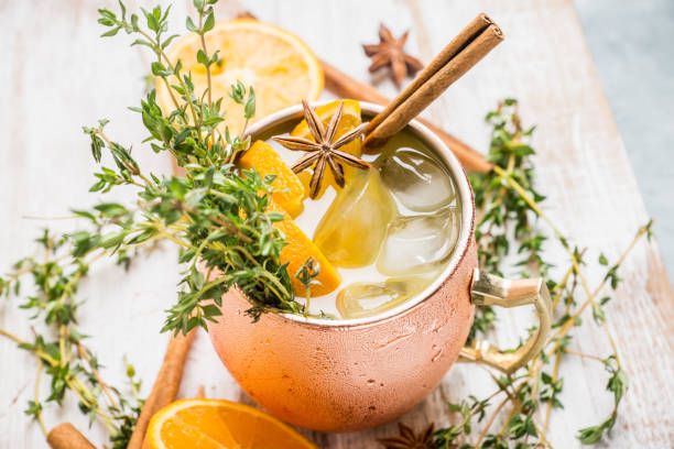 istock Cold orange Moscow mule cocktail in copper mug 941446546