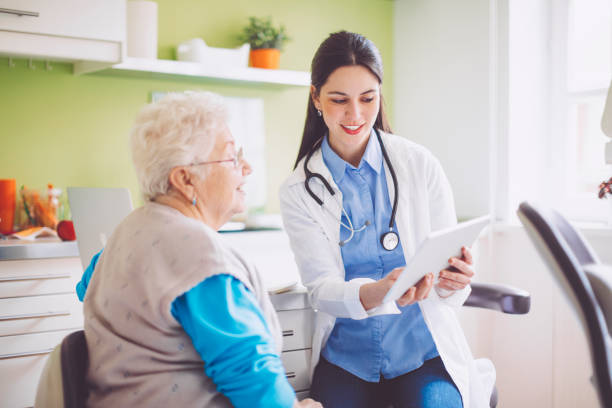 istock Doctor consulting her patient 941446620