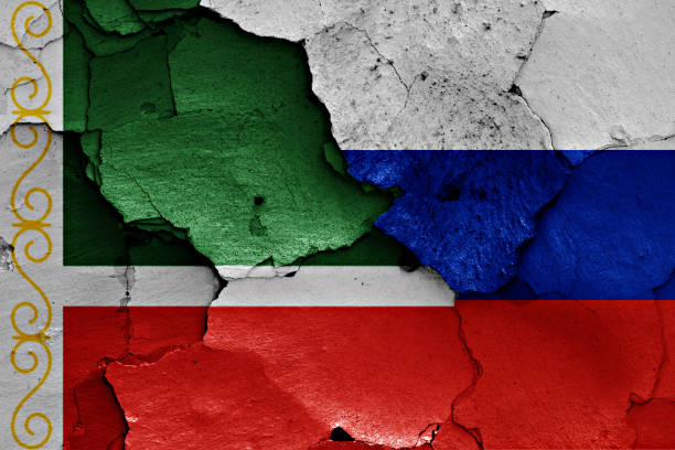 istock flags of Chechnya and Russia painted on cracked wall 941446842