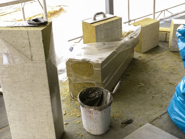 istock Insulation and tools, bucket of mortar. Rock wool for insulation of the outer wall. 941450276