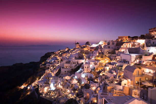 istock The famous sunset at Santorini in Oia village 941450430