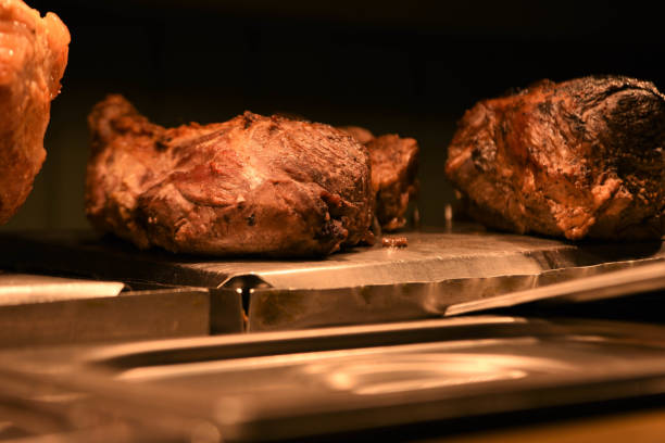 istock succulent whole cooked roast leg of lamb 941456130