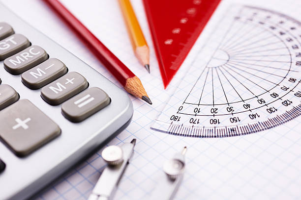Geometry set with pencil, rules and calculator stock photo