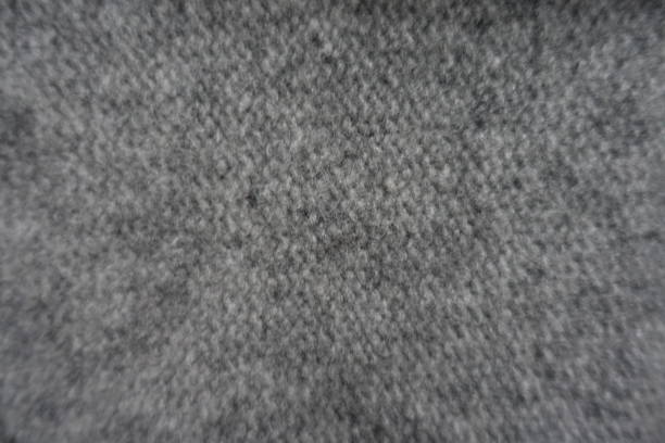 istock Handmade grey reverse stockinette stitch fabric from above 941462580