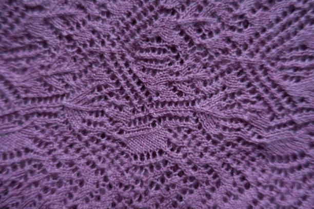 istock Tender pink handmade knitted lace from above 941462888
