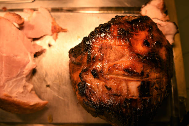 istock succulent whole roast pork and sliced gammon joint 941462926