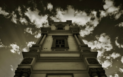 Abandoned old mansion circa 1920's - 30's, land cleared ready for demolition to make way for new development.