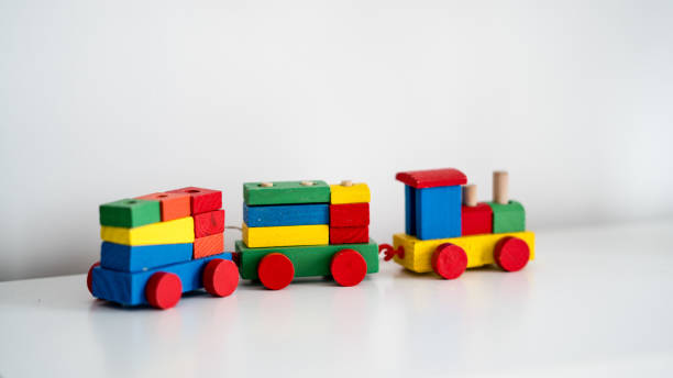 istock baby wooden toy train set on white background 941470594