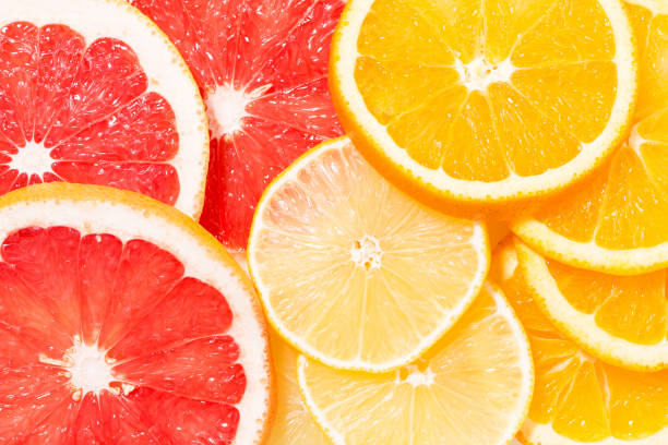 istock assortment of fresh citrus slices, top view 941472194