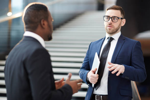 istock Talking to colleague 941473960