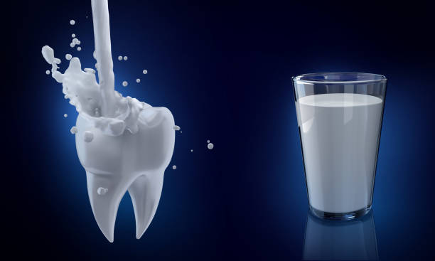 istock Dental background. 3d illustration. 3d render tooth fang on blue background. Milk splash. 941474858