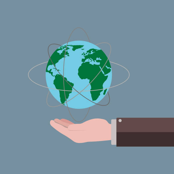 istock hand holding planet, peace sign, globe in the hands of businessm 941474978