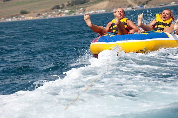 istock Happy couple tubing 94147537