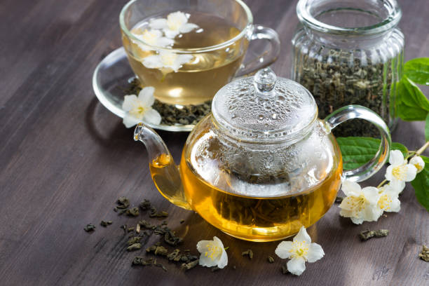istock green tea with jasmin on wooden table 941477250