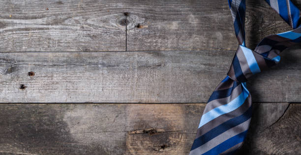 istock Father's day concept - present, tie on rustic wood background 941481064