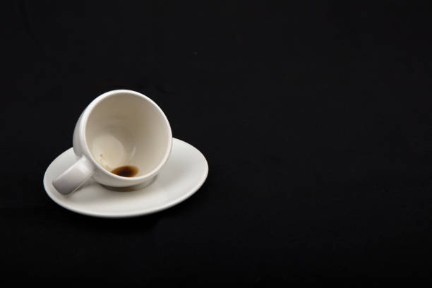 Empty little cup of coffee on the side stock photo