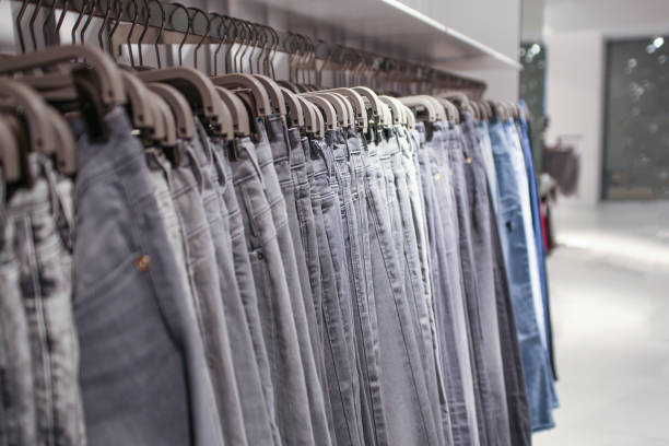 istock Jeans on a Hangers in Store 941489056