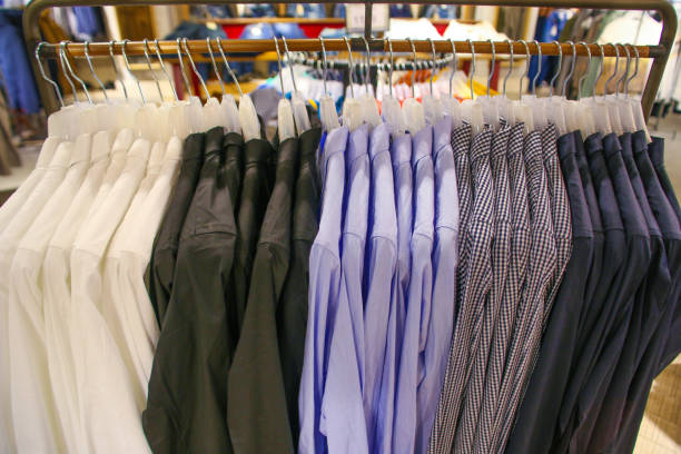 istock Shirts on a Hangers in Store 941491432