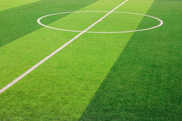 istock The white Line marking on the artificial green grass soccer field 941497636