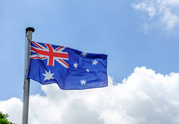 istock Australian flag blowing in the wind 941504940