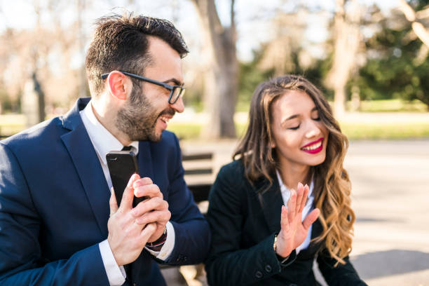 istock Business partners taking break in the park during trip 941511422