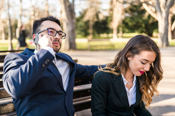 istock Business consultants having a lunch break on the bench 941511516