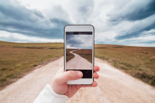 istock Taking a picture of a road 941511560