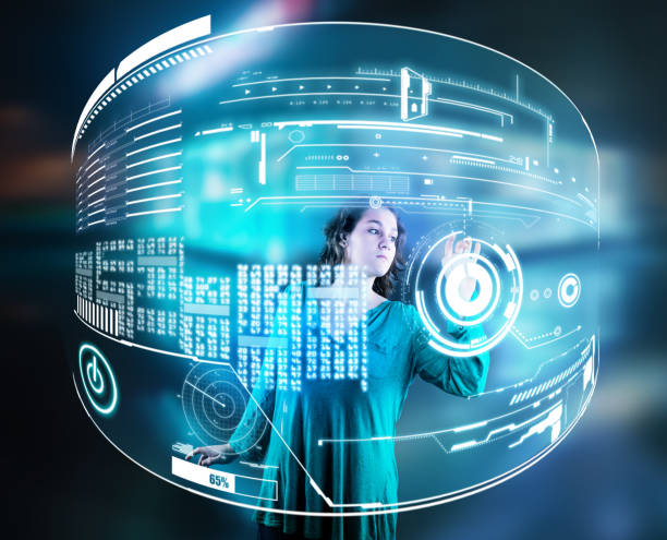 istock Woman working on hologram of a digital screen, displayed with data. 941511644