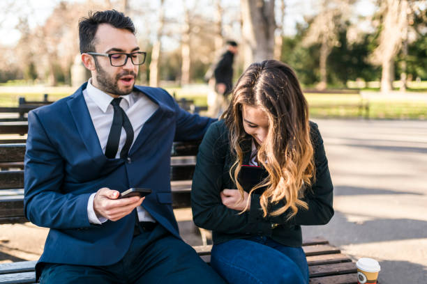istock Company executives taking a break on the park bench 941511668