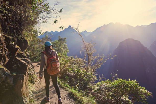 istock Young girl hike in beautiful landscape 941511764
