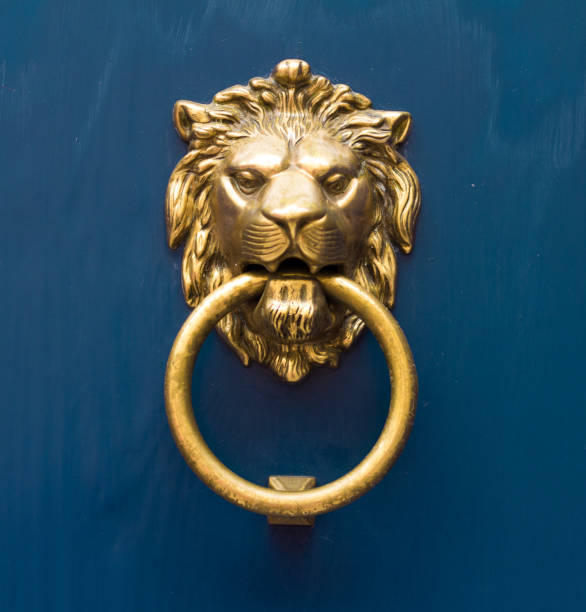 istock gold lion antique door knob 941512986