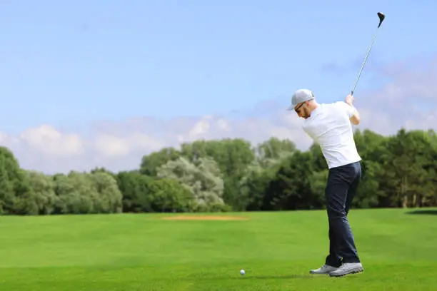 Photo of Golfer hit a golf ball