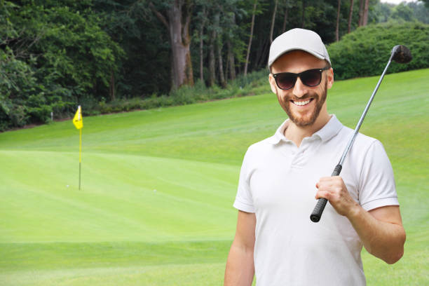 istock Golfer with golf club 941523006