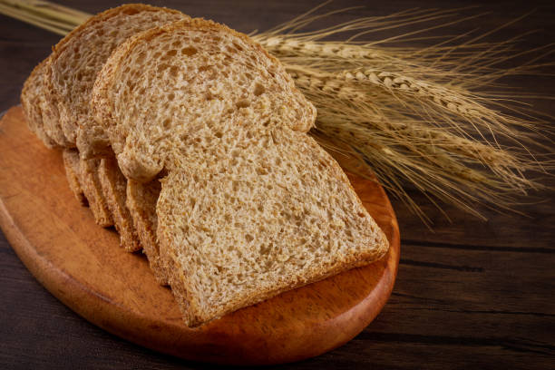 istock Breads toast on wooden background 941525952