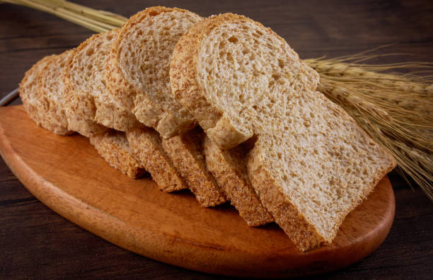 istock Breads toast on wooden background 941526128