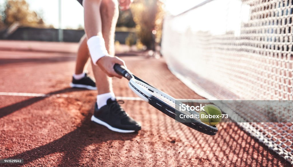 Tennis player. Sport, recreation concept Tennis. Young man playing tennis, close up photo. Sport, recreation concept Tennis Stock Photo