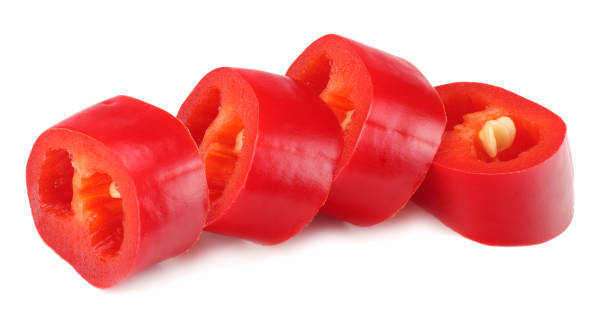 istock sliced red hot chili peppers isolated on white background 941530100