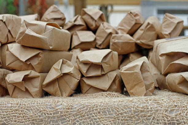istock Presents wrapped in Kraft paper lie on burlap 941531182