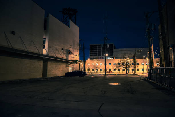 istock Big empty urban city parking lot at night 941534592