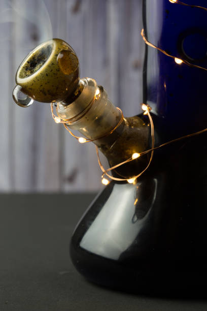 istock Blue bong with small lights wrapped around 941542000