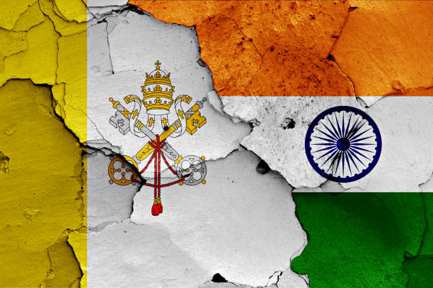 istock flags of Vatican and India painted on cracked wall 941545226