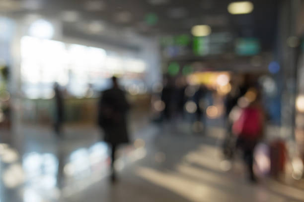 istock Blurred people in airport. 941552228