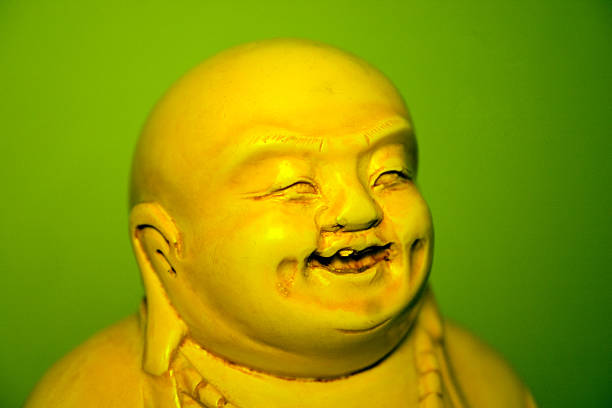 Closeup of Head Buddha statue with golden used as amulets of Buddhism religion at wat sothon temple