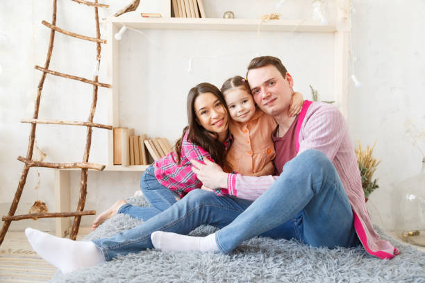 istock Happy young family portrait. 941557918