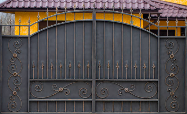 istock wrought-iron gates, ornamental forging, forged elements close-up 941559102